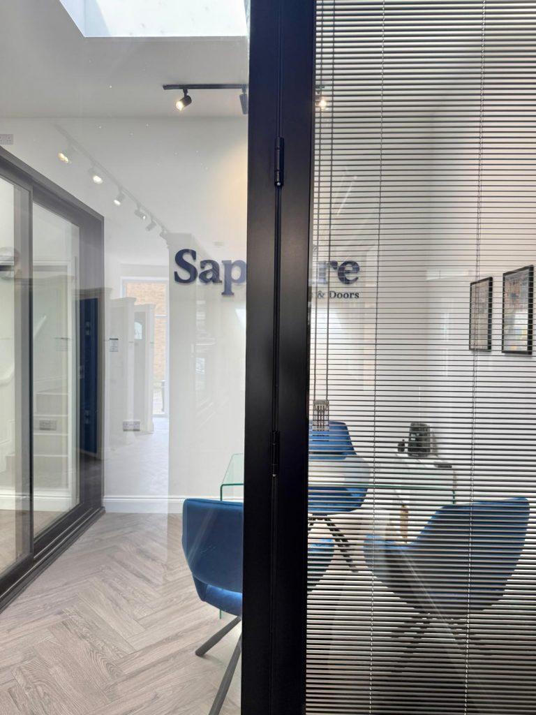 Integral Blinds in our Aluminium Bifold doors at our Sapphire Windows & Doors Showroom