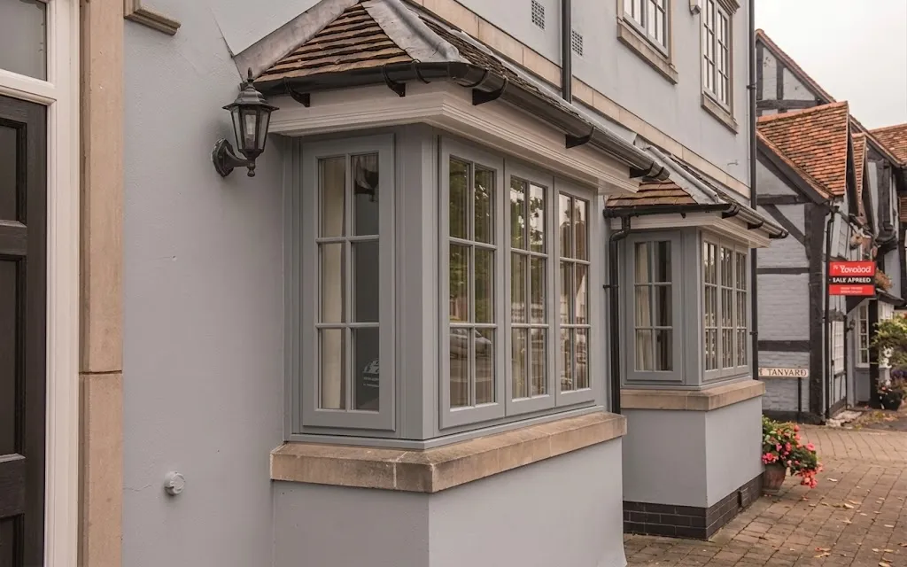 Square bay timber alternative windows designed for a traditional home