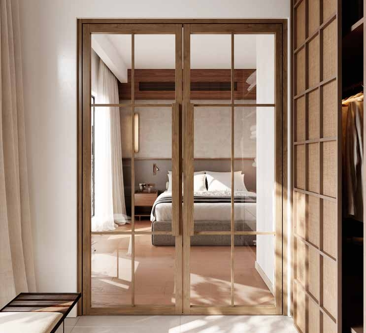 TENZO oak-framed interior door with full-height clear glazing